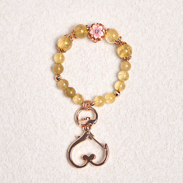 Buddha Stones Golden Rutilated Quartz Wealth Key Chain Hanging Decoration