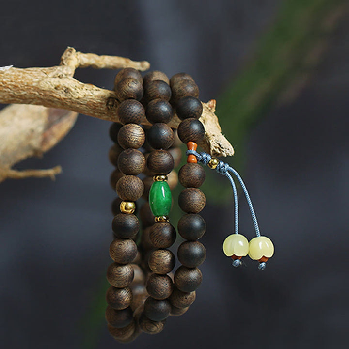 Buddha Stones 108 Mala Beads Nha Trang Bai Qinan Agarwood Cyan Jade Amber Strength Meditation Bracelet