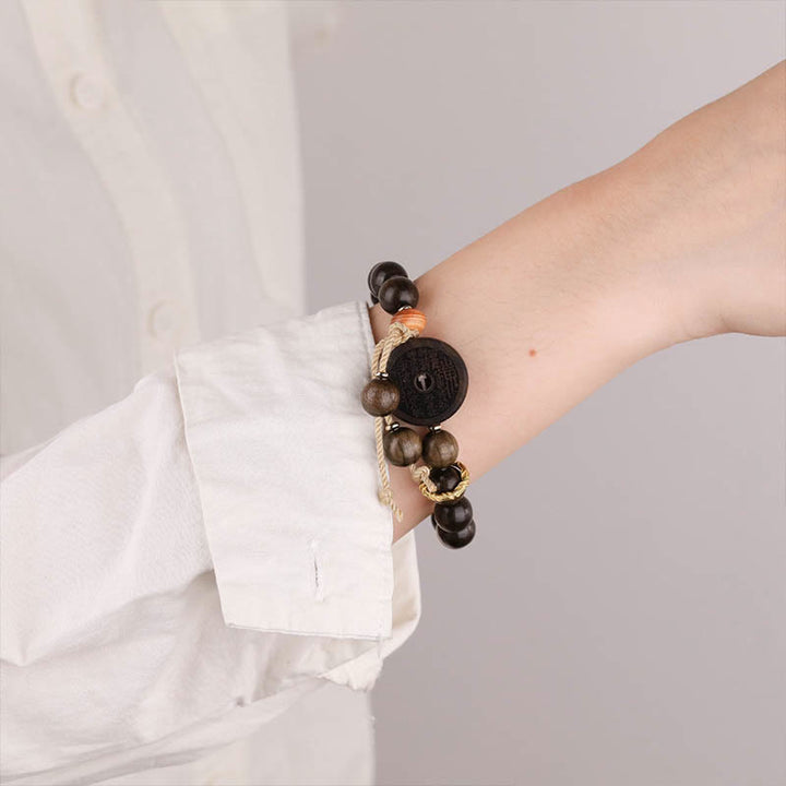 Buddha Stones Ebony Wood Mountain Ghosts Spend Money Balance Bracelet