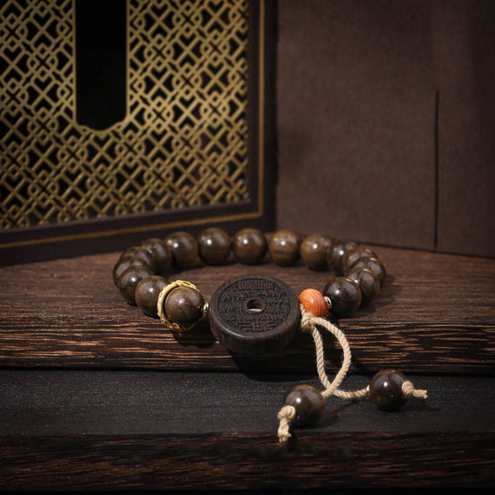 Buddha Stones Ebony Wood Mountain Ghosts Spend Money Balance Bracelet