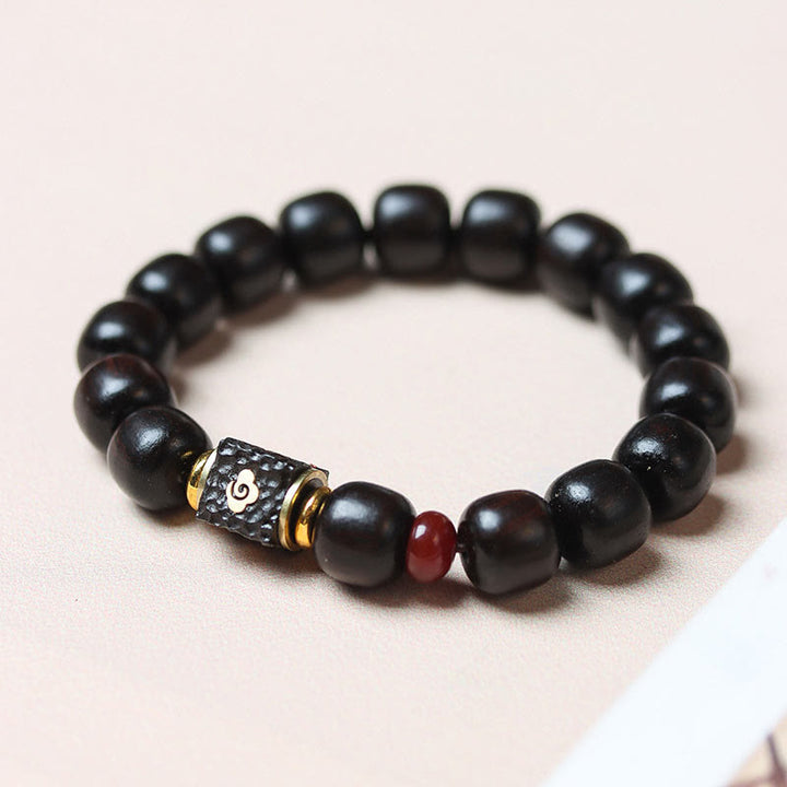 Buddha Stones Ebony Wood Auspicious Clouds Engraved Calm Bracelet