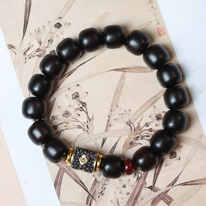 Buddha Stones Ebony Wood Auspicious Clouds Engraved Calm Bracelet