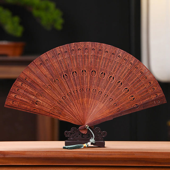 Buddha Stones Peacock Feather Carved Hollow Handheld Small Leaf Red Sandalwood Green Sandalwood Folding Fan 22.5cm