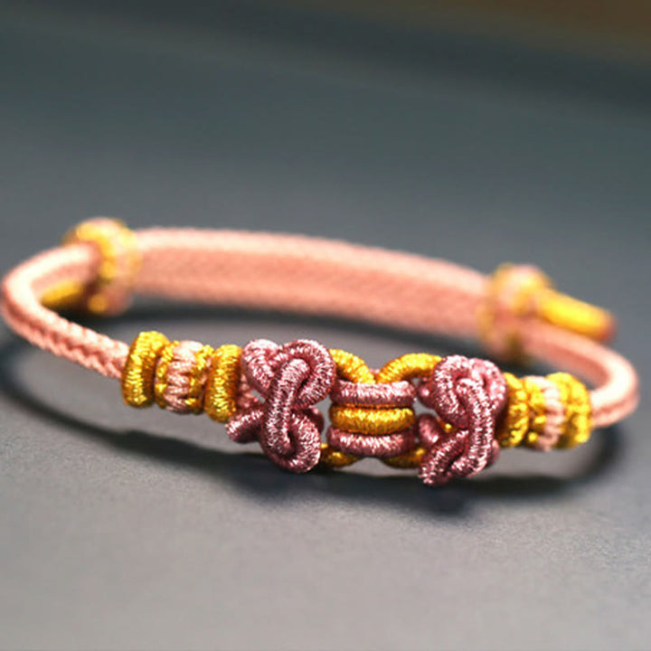 Buddha Stones Red String Saddle Knot Strength Bracelet