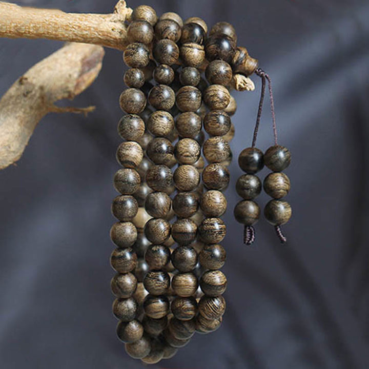 Buddha Stones 108 Mala Beads Natural Tarakan Agarwood Ward Off Evil Spirits Bracelet