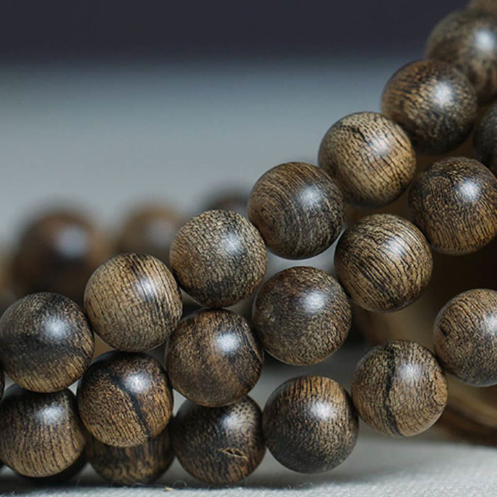 Buddha Stones 108 Mala Beads Natural Tarakan Agarwood Ward Off Evil Spirits Bracelet