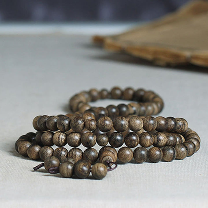 Buddha Stones 108 Mala Beads Natural Tarakan Agarwood Ward Off Evil Spirits Bracelet