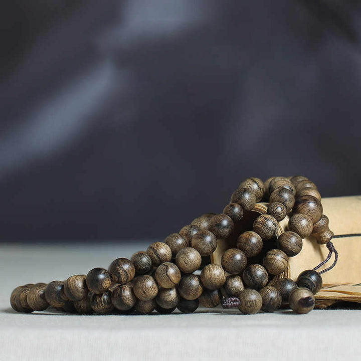 Buddha Stones 108 Mala Beads Natural Tarakan Agarwood Ward Off Evil Spirits Bracelet