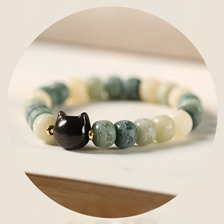 Buddha Stones Bodhi Seed Om Mani Padme Hum Carved Silver Sheen Obsidian Cat Head Wisdom Bracelet - image 16