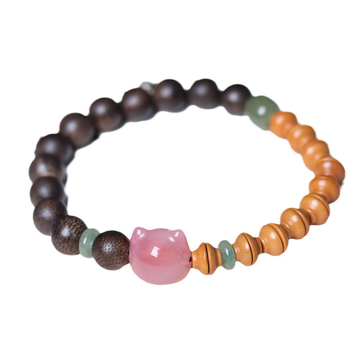 Buddha Stones 6mm Qinan Agarwood Olive Pit Yanyuan Agate Cat Shape Balance Bracelet