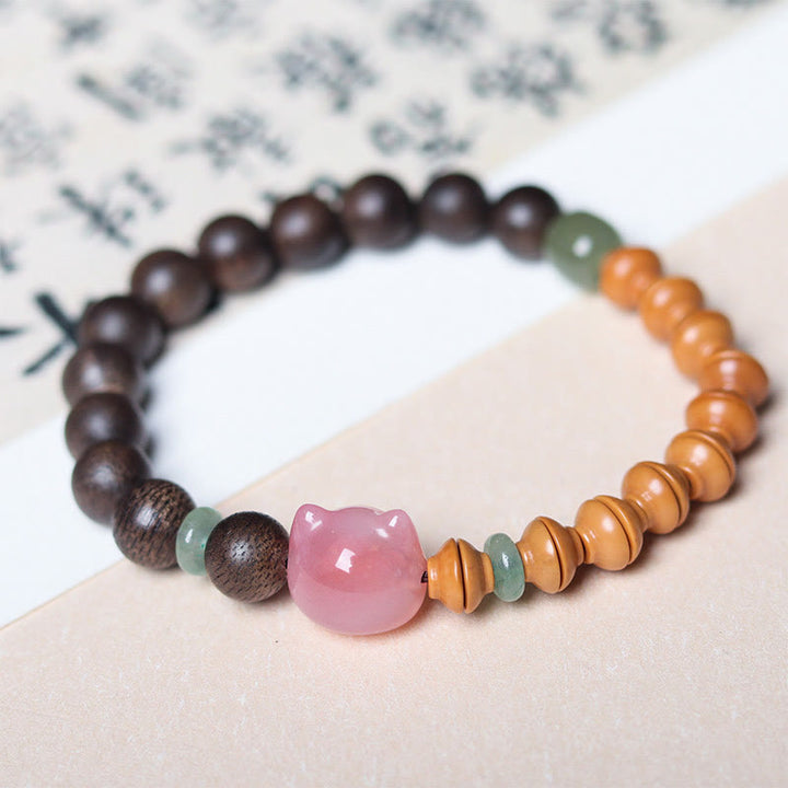 Buddha Stones 6mm Qinan Agarwood Olive Pit Yanyuan Agate Cat Shape Balance Bracelet