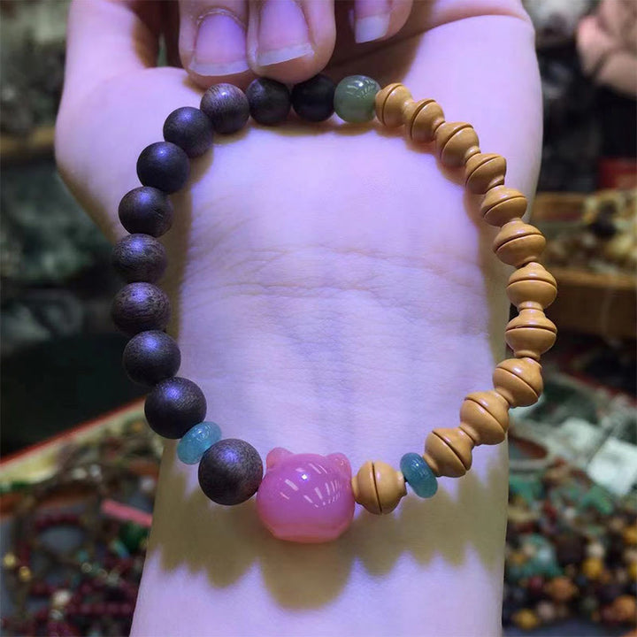Buddha Stones 6mm Qinan Agarwood Olive Pit Yanyuan Agate Cat Shape Balance Bracelet