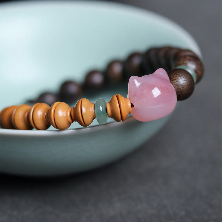 Buddha Stones 6mm Qinan Agarwood Olive Pit Yanyuan Agate Cat Shape Balance Bracelet