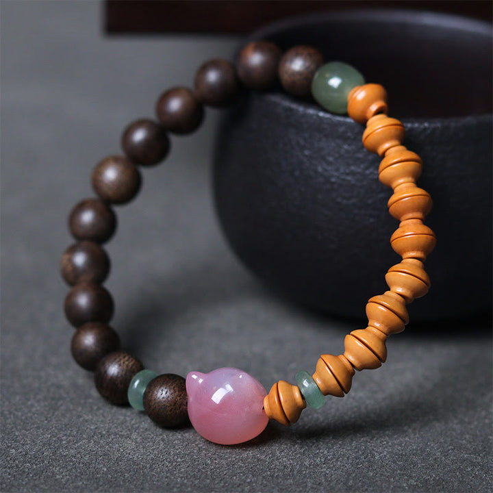 Buddha Stones 6mm Qinan Agarwood Olive Pit Yanyuan Agate Cat Shape Balance Bracelet