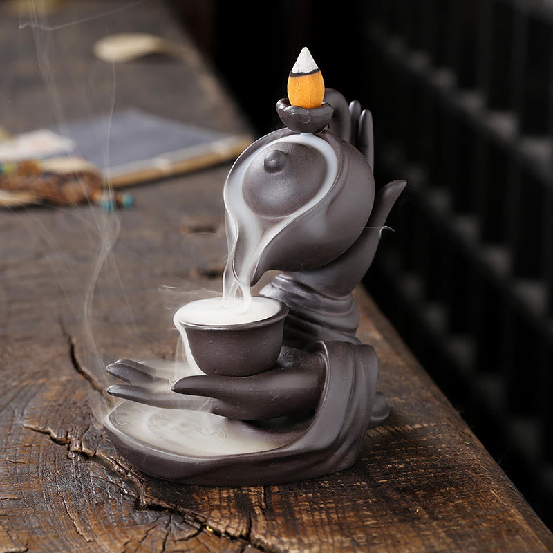 Buddha Stones Buddha Hand Holding Teapot Cup Ceramic Backflow Smoke Fountain Healing Incense Burner Decoration - Brown Black 13.7*9*13.9cm - image 0