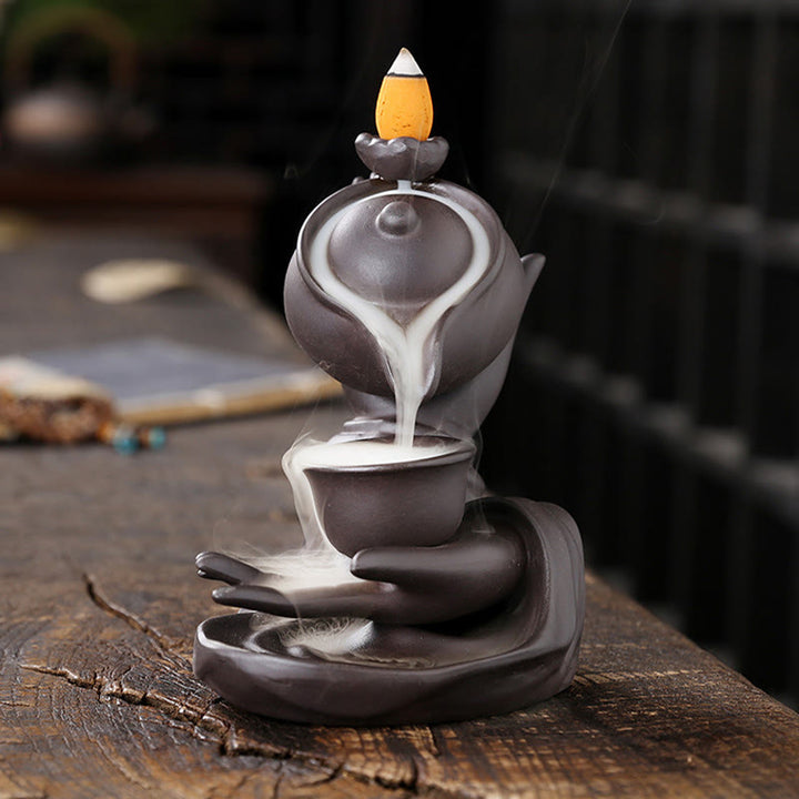 Buddha Stones Buddha Hand Holding Teapot Cup Ceramic Backflow Smoke Fountain Healing Incense Burner Decoration - image 1