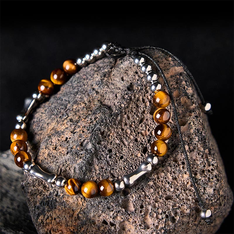 FREE Today: Power and Courage Cute Bone Pattern Tiger Eye Beads Bracelet - Tiger Eye & Titanium Steel(Wrist Circumference: 15-21cm) - image 1