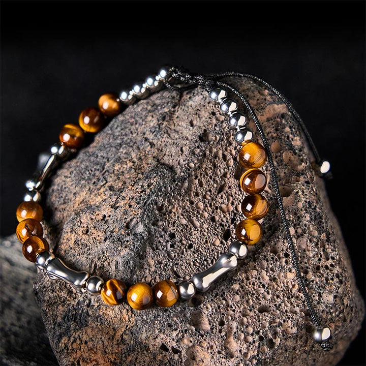 FREE Today: Power and Courage Cute Bone Pattern Tiger Eye Beads Bracelet - Tiger Eye & Titanium Steel(Wrist Circumference: 15-21cm) - image 1