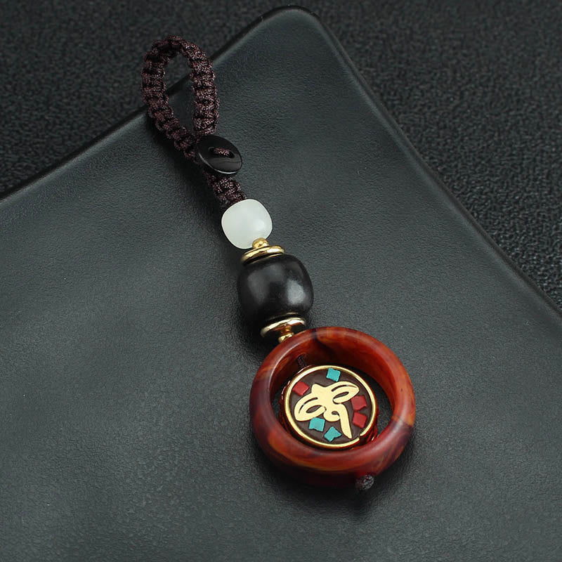 Buddha Stones Ebony Wood Sanskrit Four-leaf Clover Buddha's Eye Peace Rotatable Key Chain - image 7