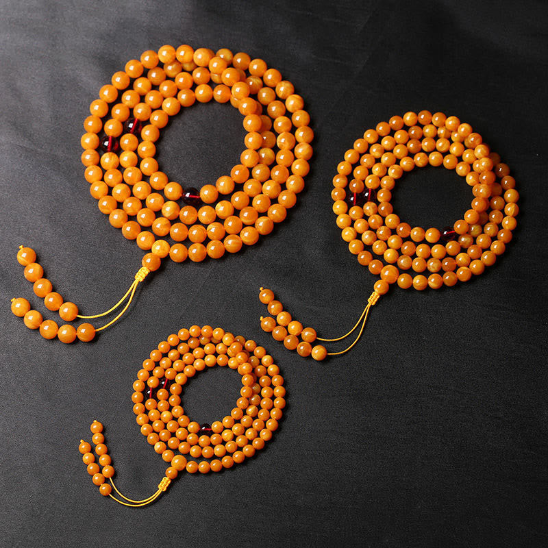 Buddha Stones Tibetan Amber Round Bead Mala - image 1