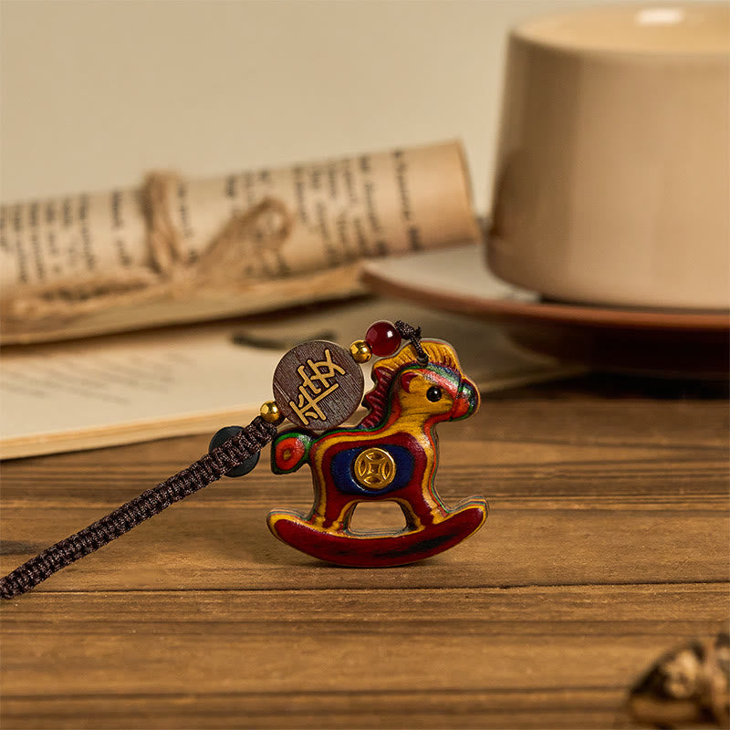 Buddha Stones Year of the Horse Rainbow Eucalyptus Small Leaf Red Sandalwood Linden Wood Ebony Carved Positive Key Chain - image 1