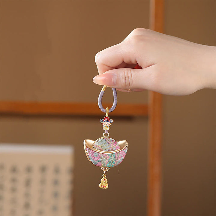 Buddha Stones Song Brocade Yuanbao Luck Keychain - image 1