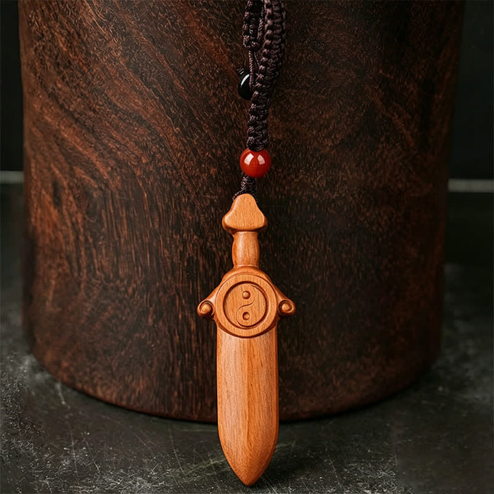 Buddha Stones Jujube Wood Yin Yang Balance Engraved Sword Keychains - image 1