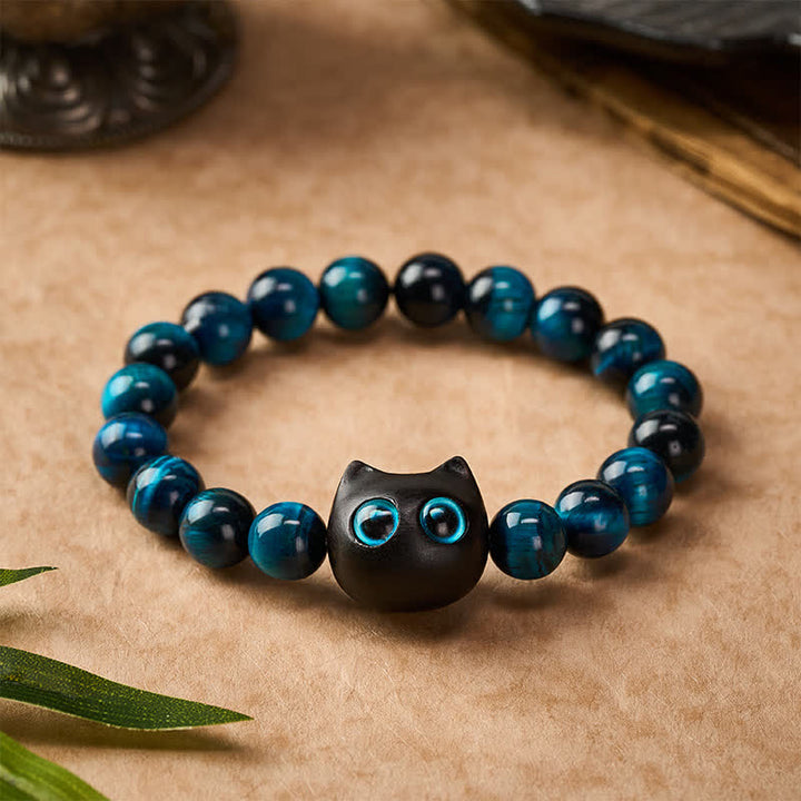 Buddha Stones Blue Tiger Eye Ebony Wood Cat Strength Bracelet - image 1