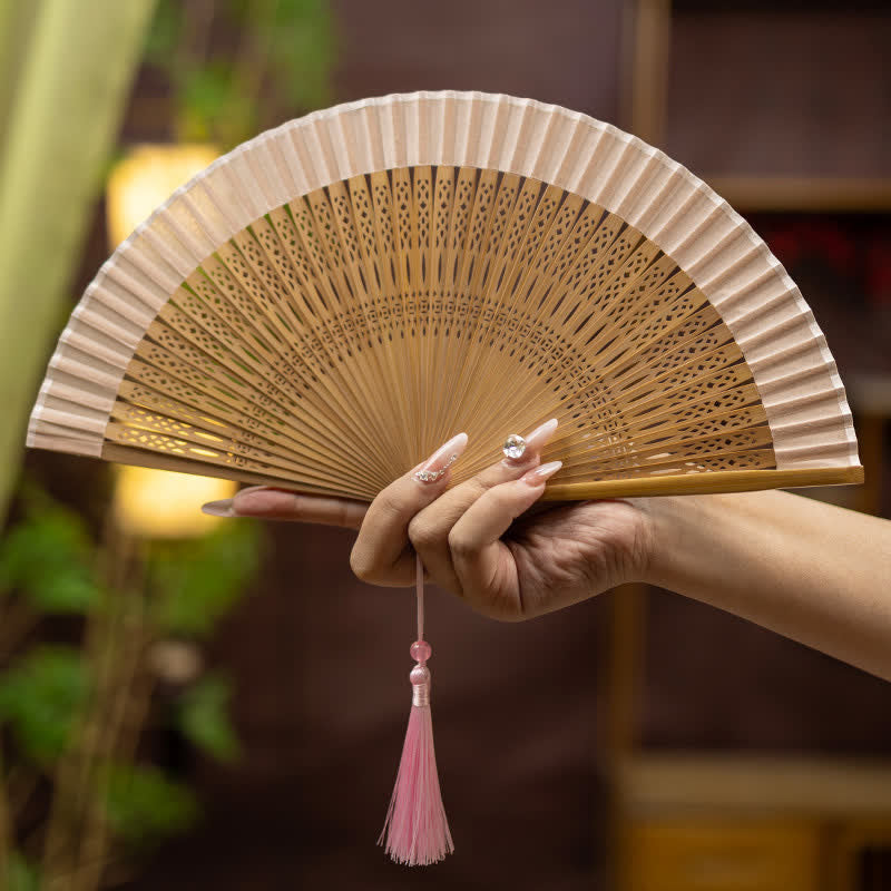 Buddha Stones Inspired Hollow Carved Bamboo Tassel Simple Folding Fan - Pink(Complimentary Tassel) - image 1