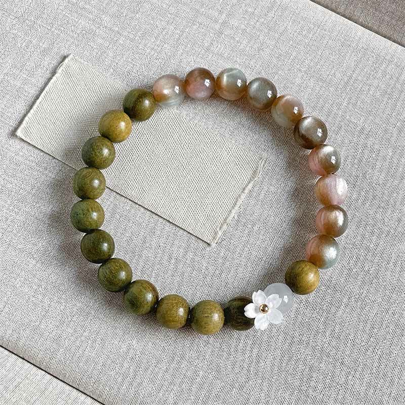 Buddha Stones Green Sandalwood Cat's Eye Flower Charm Serenity Bracelet - 8mm Pink Beads - image 0