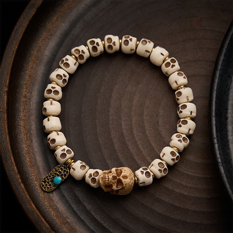 Buddha Stones Hand-Carved Bone Beads Lord of the Corpse Forest Skull Pattern Strength and Change Tibetan Bracelet - 9×6.3mm - image 0