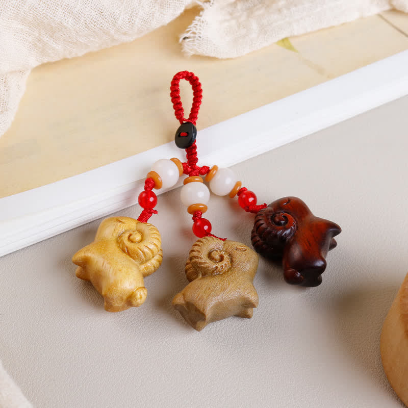 Buddha Stones Hand-Carved Sandalwood Ebony Wood Three Goats Prosperity Keychains - Three Goats - image 0