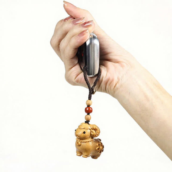 Buddha Stones Rainbow Eucalyptus Sandalwood Goat Serenity Hand-Carved Keychains - image 11