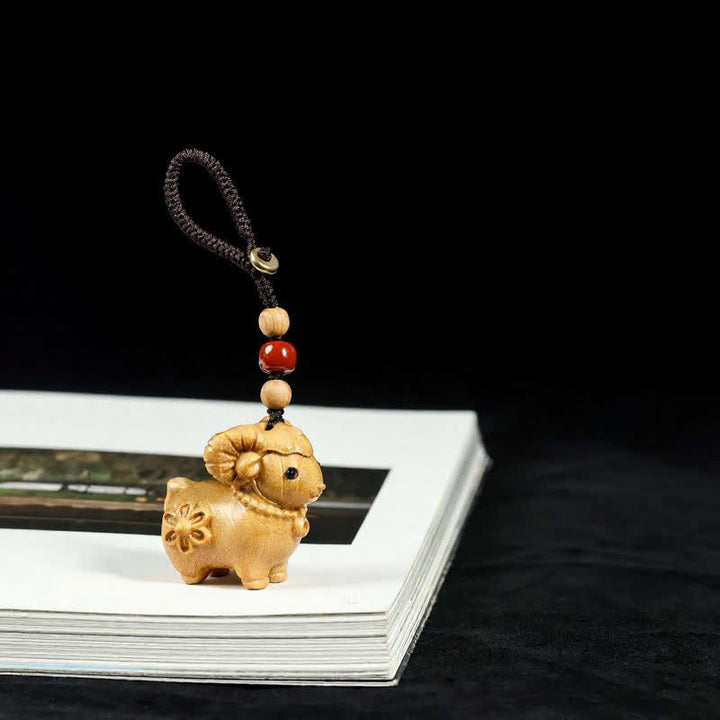 Buddha Stones Rainbow Eucalyptus Sandalwood Goat Serenity Hand-Carved Keychains - Sandalwood - Braided Rope - image 10