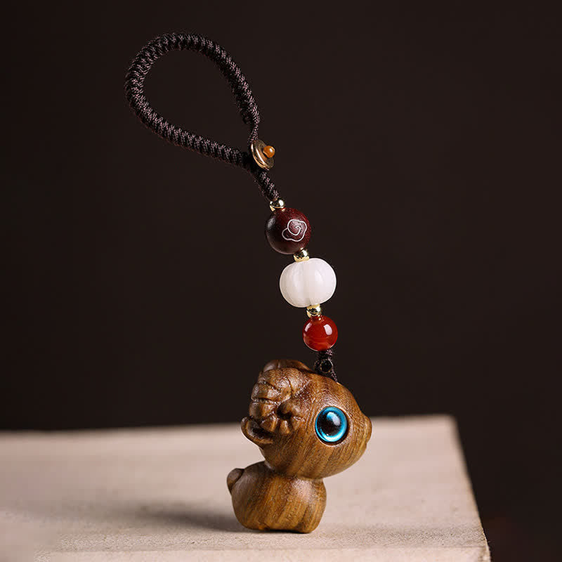 Buddha Stones Year of the Goat Green Sandalwood Red Sandalwood Zodiac Sheep Serenity Hand Carved Braided Keychains - image 1