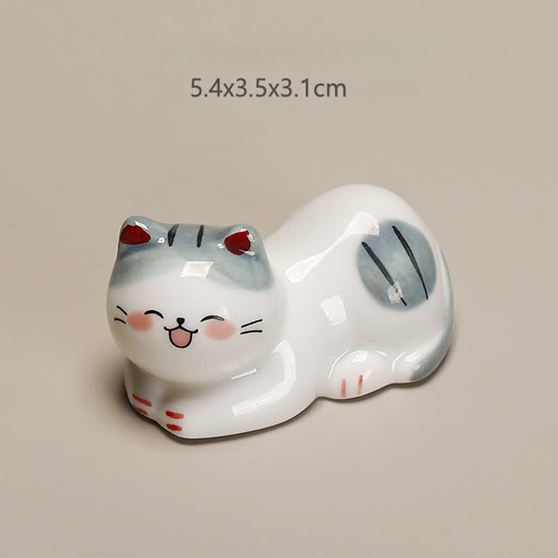 Buddha Stones Small Ceramic Lucky Cat Tabletop Chopstick Holder - Cat Lying On Its Left Side Approx. 5.4 × 3.5 × 3.1 cm - image 1