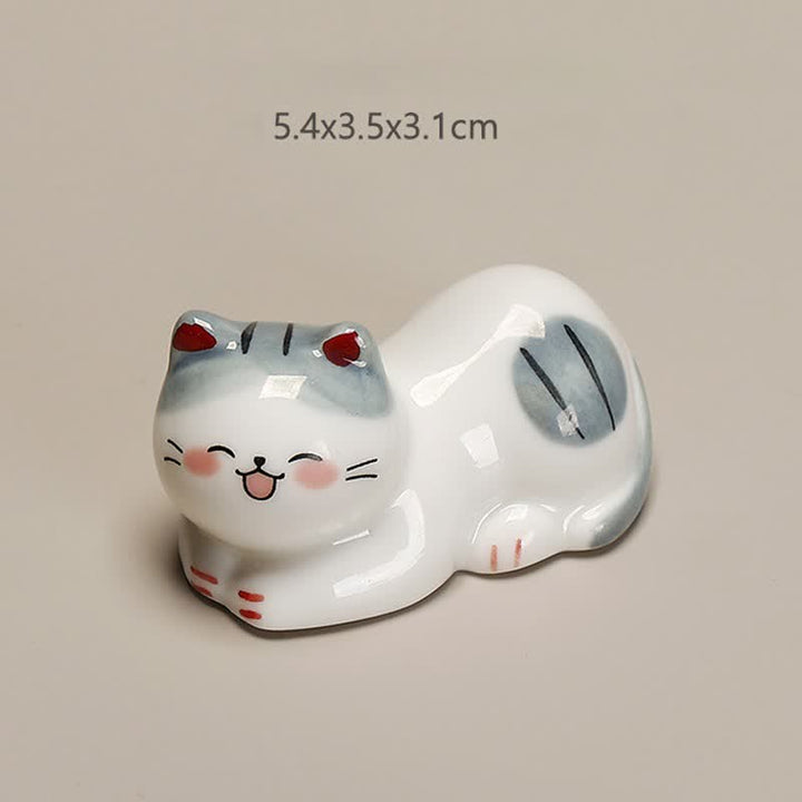 Buddha Stones Small Ceramic Lucky Cat Tabletop Chopstick Holder - Cat Lying On Its Left Side Approx. 5.4 × 3.5 × 3.1 cm - image 1