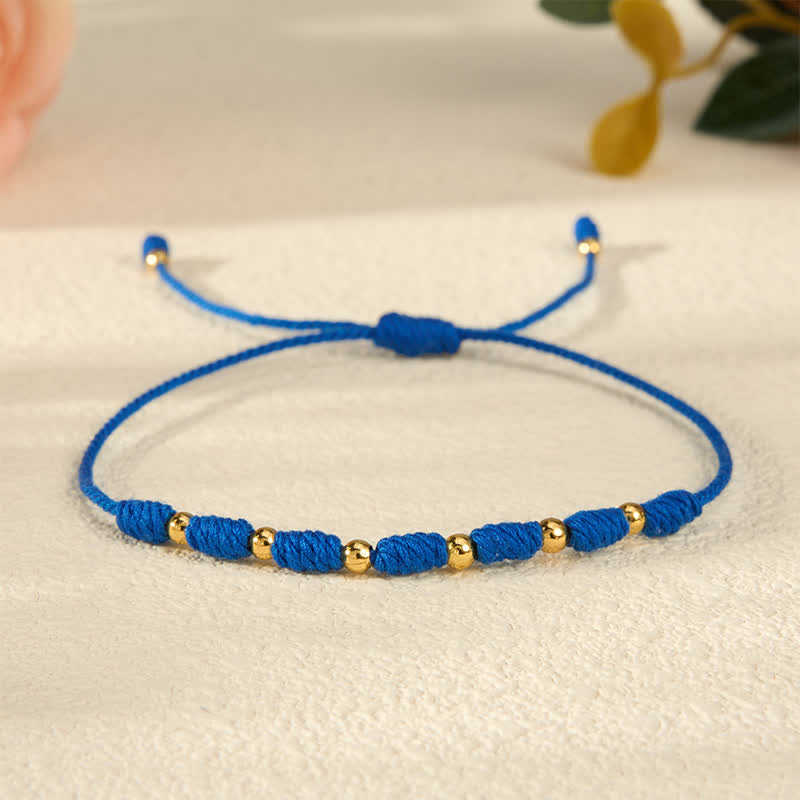 Buddha Stones Copper Beads Blue String Strength Balance Bracelet - image 1