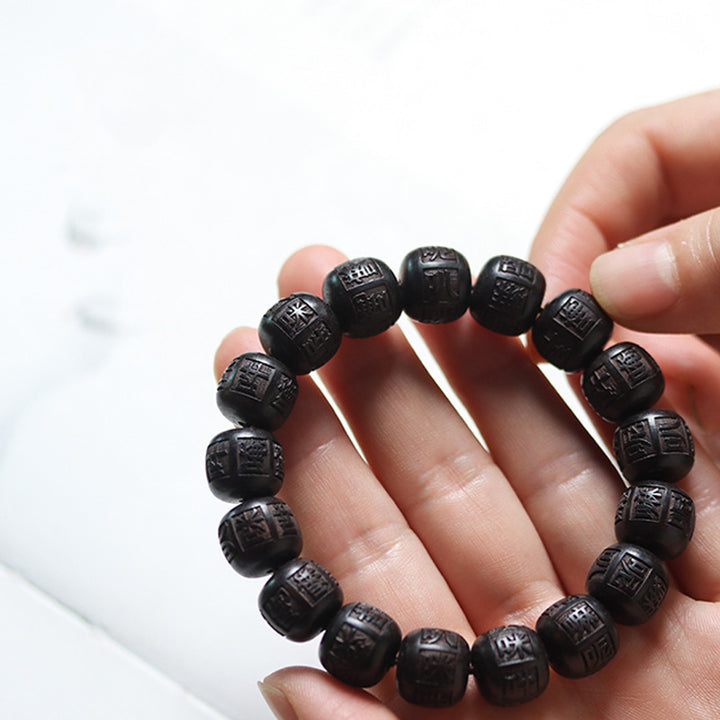 FREE Today: Protect From Negative Energy Tibet Ebony Wood Om Mani Padme Hum Engraved Balance Bracelet