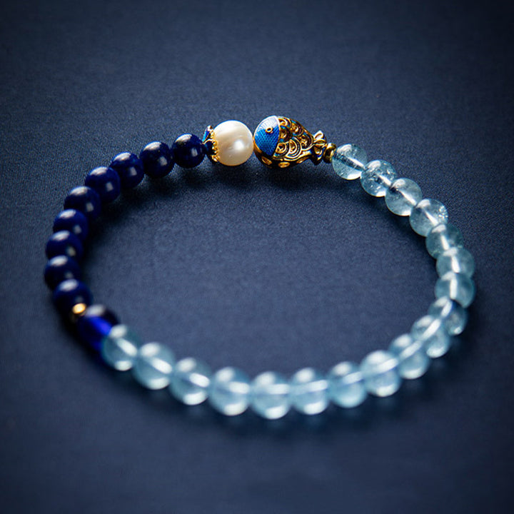 Buddha Stones Natural Aquamarine Lazurite Lapis Lazuli Fish Healing Bracelet - image 0