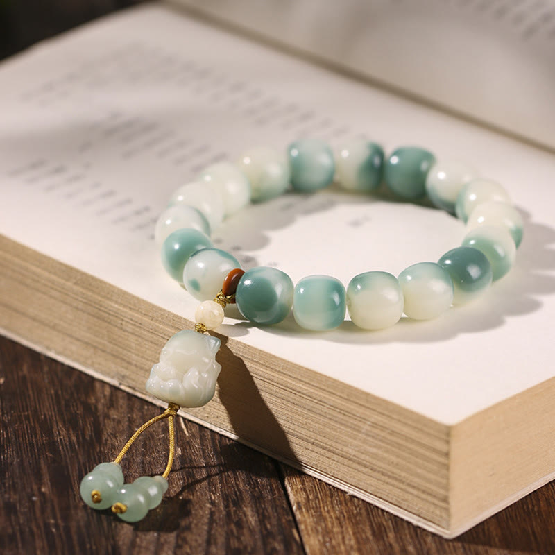 Buddha Stones Gradient Bodhi Seed Nine Tailed Fox Cat Paw Claw Pine Cone Peace Bracelet - Nine-Tailed Fox(Nine-Tailed Fox Random Color-Wrist Circumference 16-17cm) - image 1