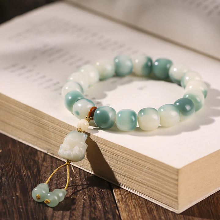 Buddha Stones Gradient Bodhi Seed Nine Tailed Fox Cat Paw Claw Pine Cone Peace Bracelet - Nine-Tailed Fox(Nine-Tailed Fox Random Color-Wrist Circumference 16-17cm) - image 1