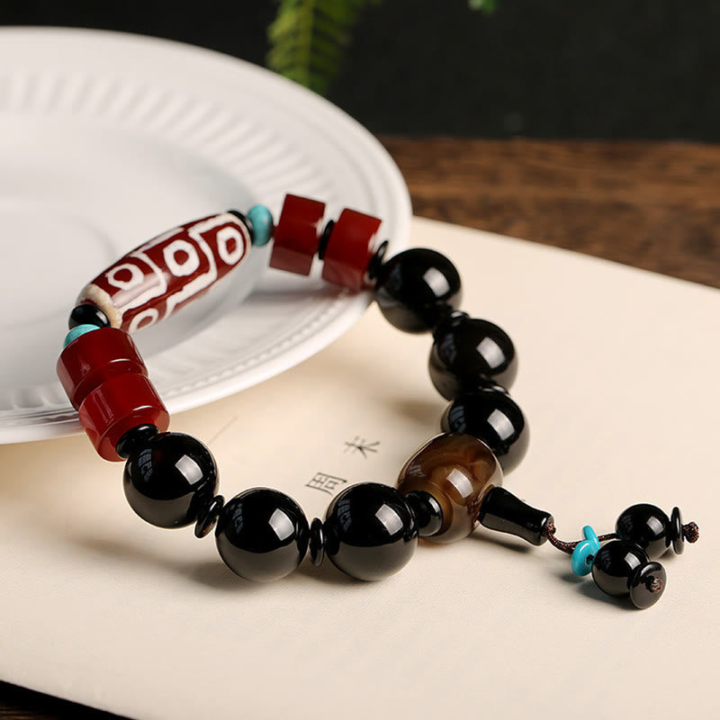 Tibetan Nine-Eye Dzi Bead Black Onyx Wealth Protection Bracelet