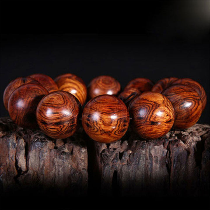 Buddha Stones Tibetan Rosewood Warmth Bracelet (Random Type)