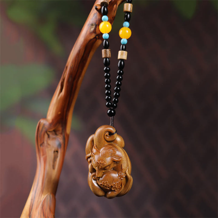 Buddha Stones Mini Nine-Tailed Fox Green Sandalwood Peace Decoration Car Hanging Decoration