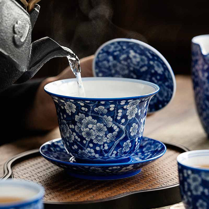 Buddha Stones Plum Blossom Blue And White Porcelain Ceramic Gaiwan Sancai Teacup Kung Fu Tea Cup And Saucer With Lid 185ml